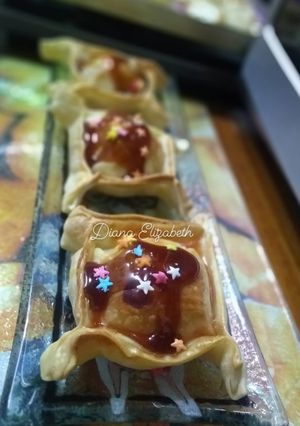 Una foto de Pastelitos de manzana y mermelada de tomate. 🍎🍅👩🏼‍🍳