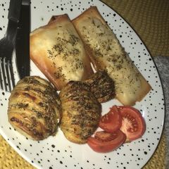 A picture of Phili Chicken In Filo Pastry with hassleback potatoes.