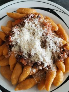 Una foto de Ñoquis de zapallo