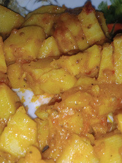 A picture of Red sauce potatoes.