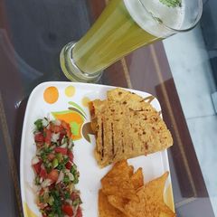 A picture of Quesadilla with Salsa.