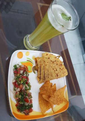A picture of Quesadilla with Salsa.