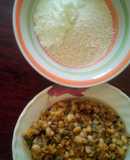 Beans porridge and spring onion plus garri, milk and sugar