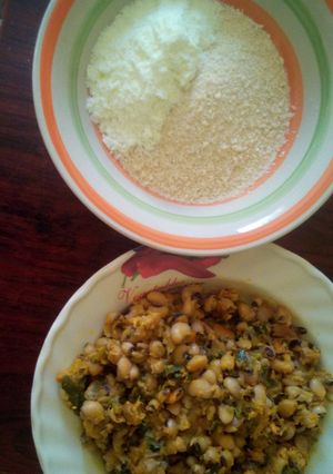 A picture of Beans porridge and spring onion plus garri, milk and sugar.