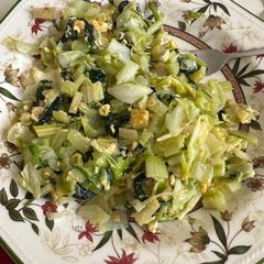 A picture of Main dish with egg, cabbage, celery and spinach.