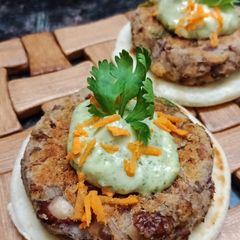 A picture of Galouti kebab on crispy naan.