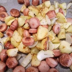 Hot dog, potato and onion roast A picture of Hot dog, potato and onion roast.