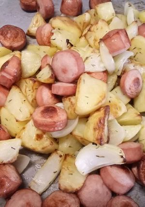 A picture of Hot dog, potato and onion roast.