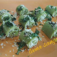 A picture of Cheesy Spinach khandvi.