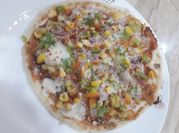 A picture of cheese corn dosa