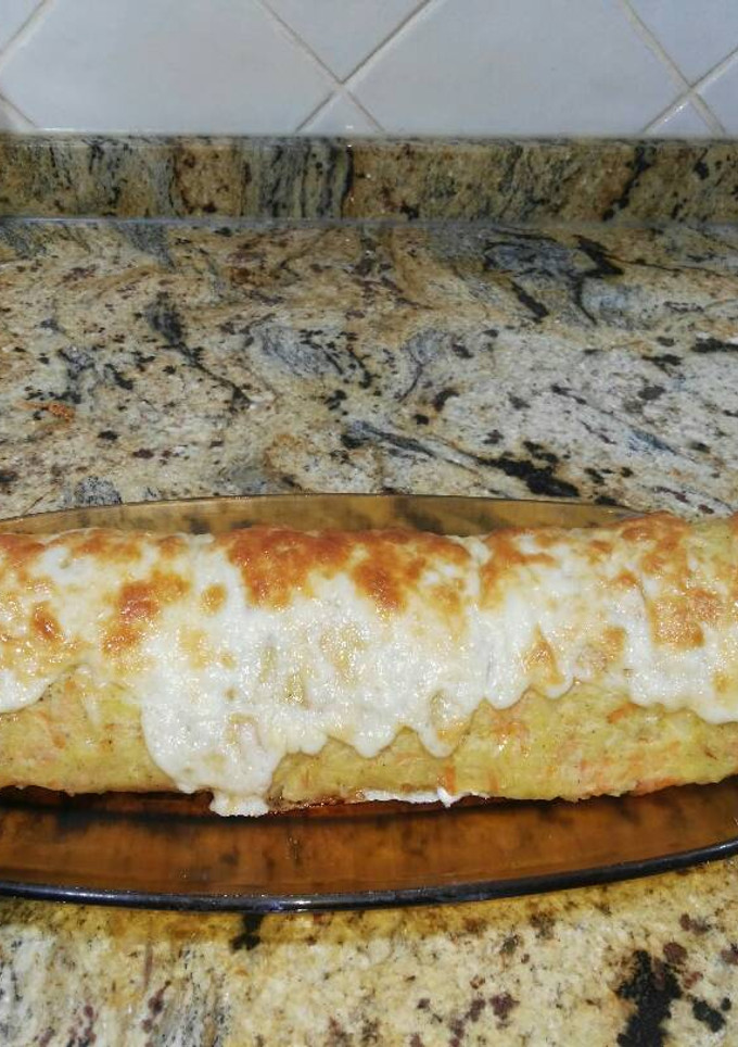 Una foto de Rollo de patata relleno de jamón york y queso