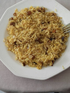 Una foto de Arroz al curry con frutos secos