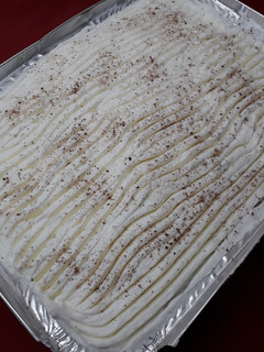 A picture of Ravani with Whipped Cream.