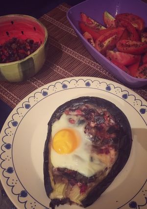 Una foto de Canoa de berenjena con tomates alOrégano