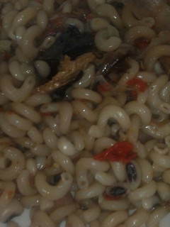 A picture of Macaroni and beans and dried fish.