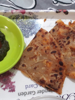 A picture of Aaloo corn Paranthas.