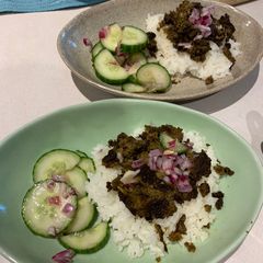 A picture of Thai inspired ground beef with cucumber salad.