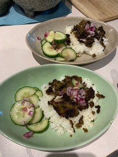 A picture of Thai inspired ground beef with cucumber salad.