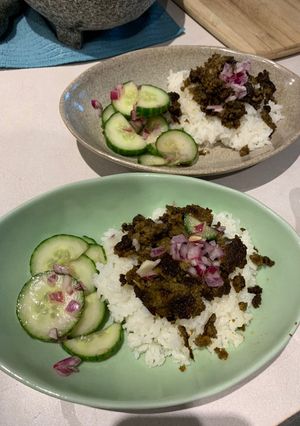 A picture of Thai inspired ground beef with cucumber salad.