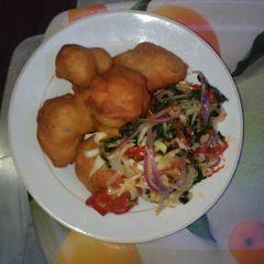 A picture of Akara and assorted steamed vegetable.