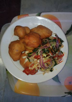 A picture of Akara and assorted steamed vegetable.