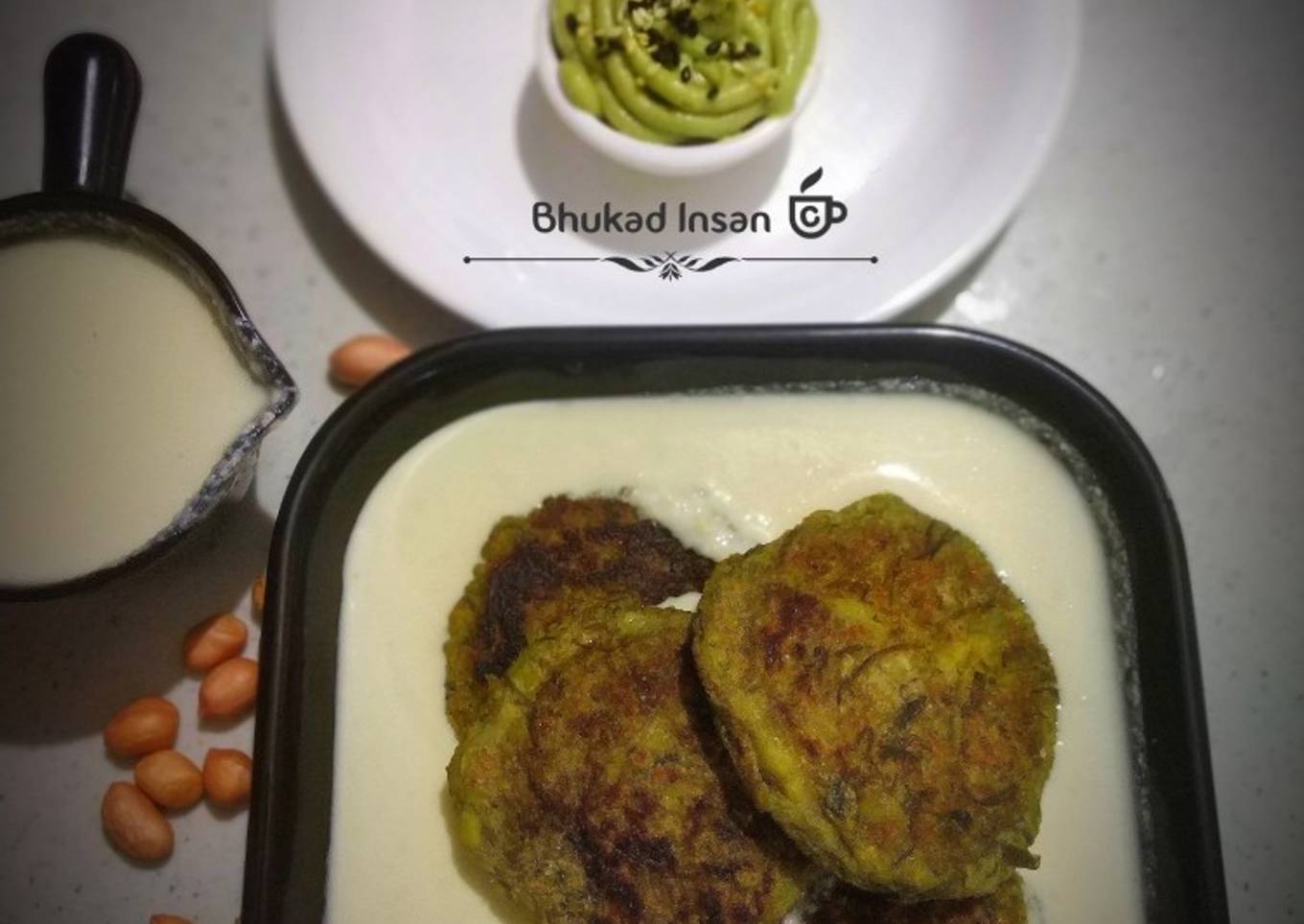 Spinach Banana patty with peanut cheese gravy and spinach hummus