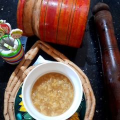 Mil's Fresh,quick Ginger garlic with mortar pestle A picture of Mil's Fresh,quick Ginger garlic with mortar pestle.