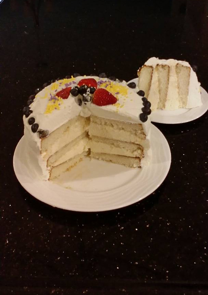 A picture of Vanilla Layer Cake with Lemon Cream Filling and Lemon Whipped Cream Frosting.