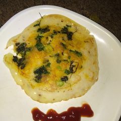 A picture of Rava onion uttapam.