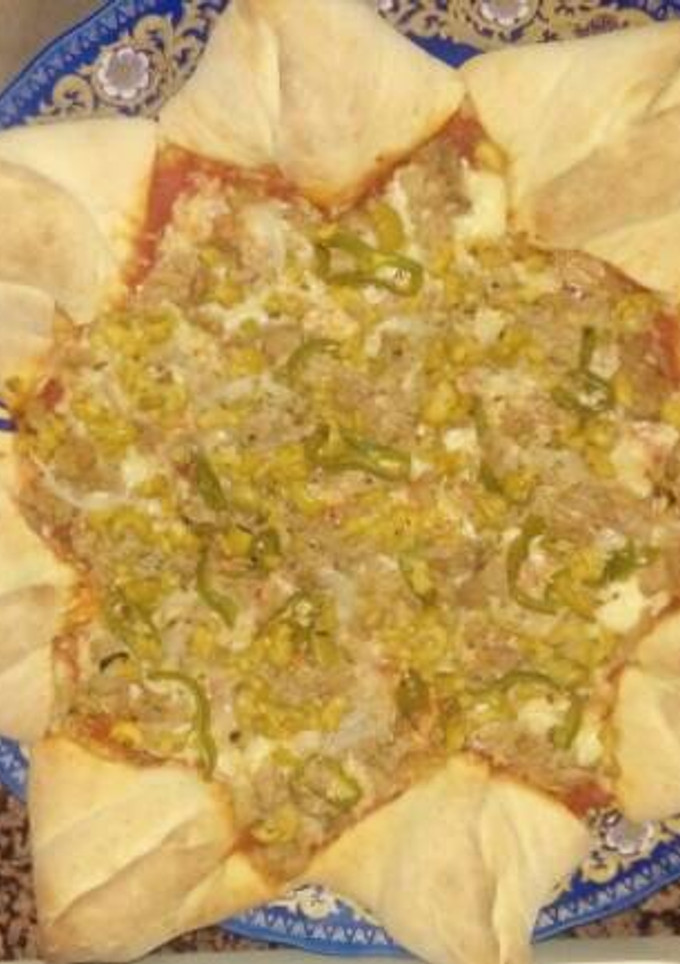 Una foto de Pizza estrella