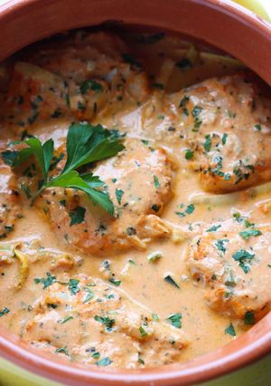 A picture of Baked cod in red pepper sauce.