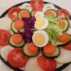 A picture of Tomatoes salad.