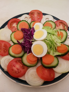 A picture of Tomatoes salad.