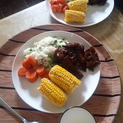A picture of Mutton + rice & veggies.