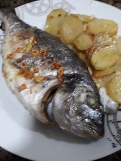 Una foto de Dorada al horno