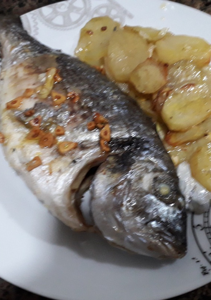 Una foto de Dorada al horno