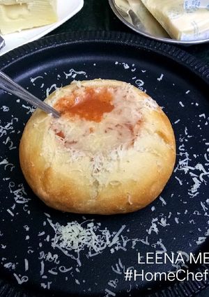 A picture of Bread Bowl with Tomato & Sweet Potato Soup.