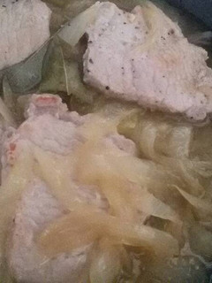 Una foto de Lomo de cerdo encebollado