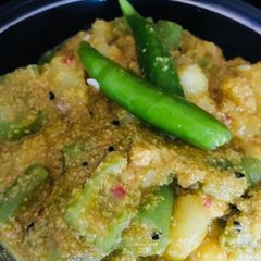 A picture of Jhinge posto ridged gourd Potato poppy seeds curry.