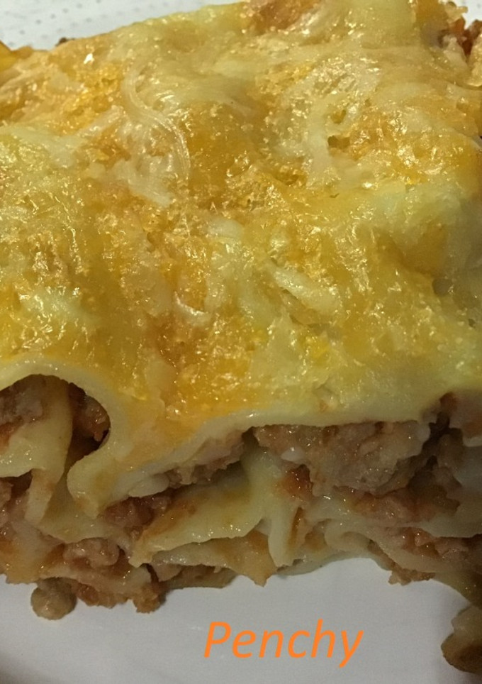 Una foto de Lasaña con aceite de trufa blanca