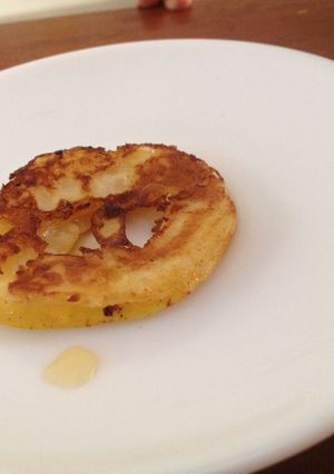 A picture of Apple cinnamon pancake rings with apple syrup.