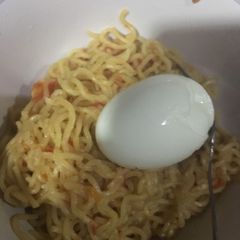 Noodles with boiled egg A picture of Noodles with boiled egg.