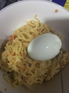 A picture of Noodles with boiled egg.