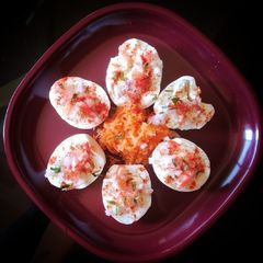Boiled eggs with veggie toppings A picture of Boiled eggs with veggie toppings.