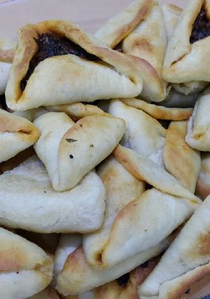 صورة لوصفة معجنات السبانخ وجبنه وبيتزا