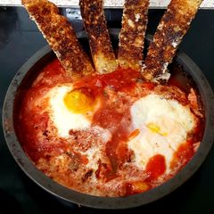 A picture of My Eggs in flavoured Tomato.
