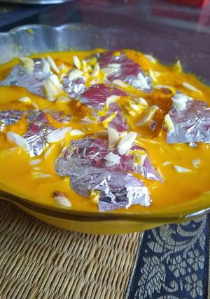 A picture of Orange rasmalai.
