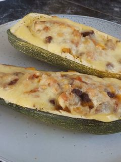 Una foto de Zapallito Italiano Relleno con Tomaticán