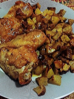 Una foto de Pollo al horno con papas