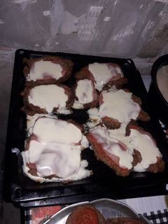 Una foto de Milanesa napolitana